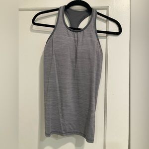 Lululemon Ruche Of Adrenaline Tank
Heathered Titanium built-in bra grey size 4